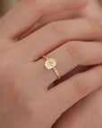 Flora's Embrace: Love in a Solid Gold Footprint Ring