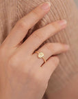 Flora's Embrace: Love in a Solid Gold Footprint Ring