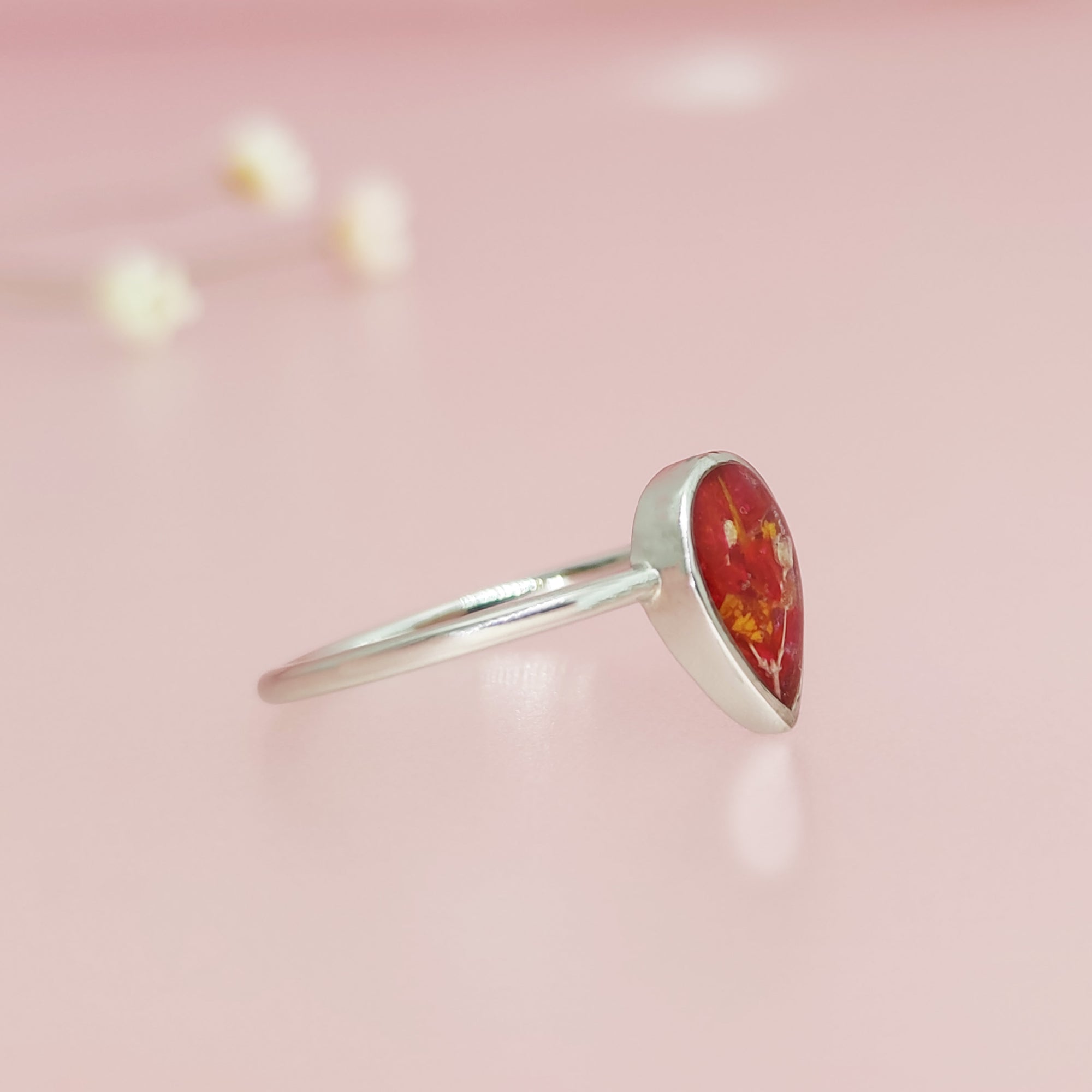 Teardrop Flower Ring: A Touch of Remembrance