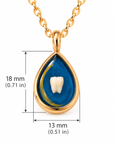 Gold teardrop pendant necklace with a blue resin inlay and a white tooth in the center, shown with dimension markers of 18 mm height and 13 mm width on a white background.