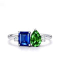 Dual-Hue Whisper: Emerald Cut & Pear Cut Moissanite Ashes Ring
