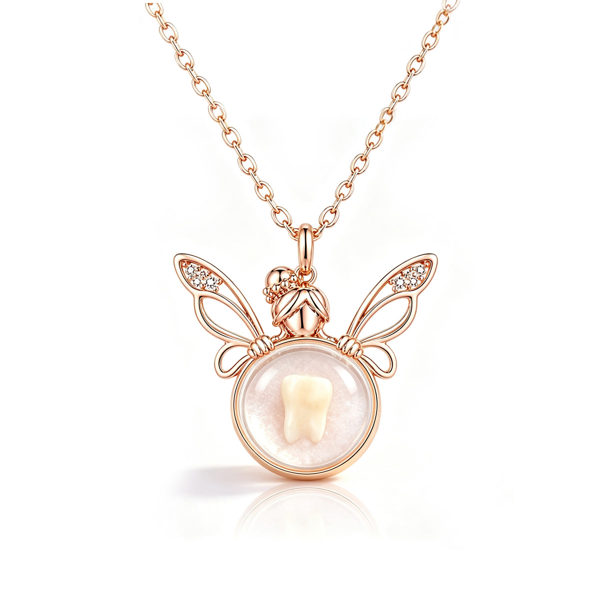 A rose gold necklace featuring a fairy-themed pendant with wings, a small fairy figure, and a round bezel containing a white tooth, shown on a clean white background.