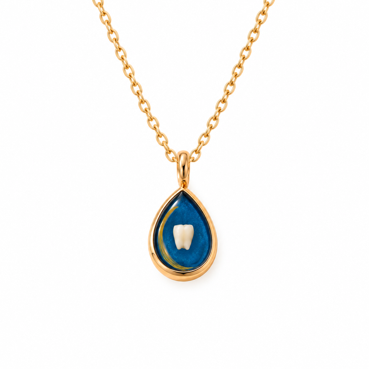 A gold teardrop pendant necklace featuring a blue enamel background with a white tooth design in the center, suspended from a gold chain on a white background.