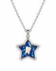 A silver star-shaped pendant necklace featuring a blue glittery background with a small white tooth in the center, suspended from a silver chain on a white background. Baby tooth keepsake.